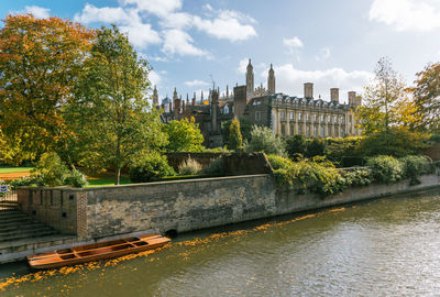 View of bridge over river against buildings