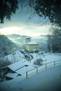 Scenic view of snow covered mountain against sky