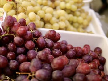 High angle view of grapes for sale at market stall