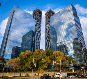 Low angle view of skyscrapers against sky