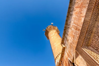 Low angle view of building against blue sky