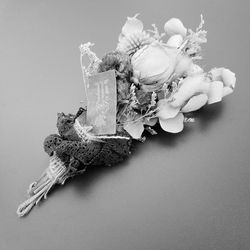 High angle view of rose flower on table