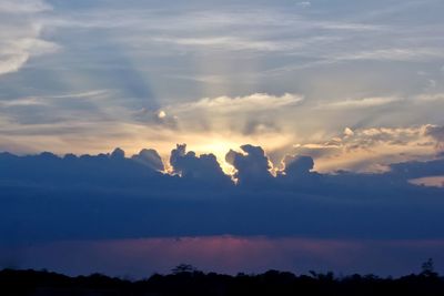 Low angle view of dramatic sky during sunset