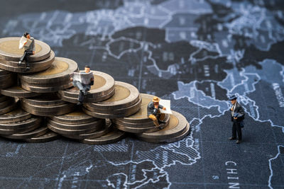 High angle view of coins on table