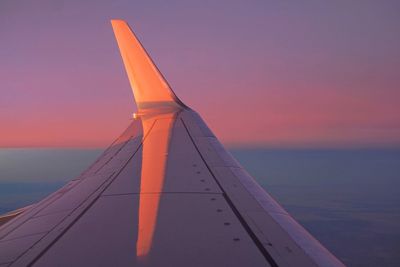 Above the earth  looking across the wing