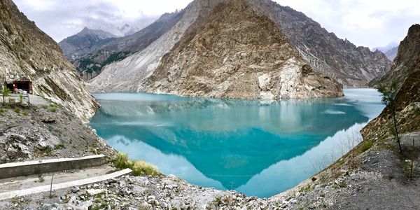 Panoramic view of lake and mountains against sky