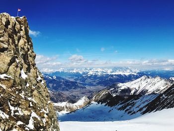 Scenic view of mountains against sky during winter