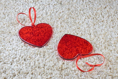 Close-up of heart shape on sand