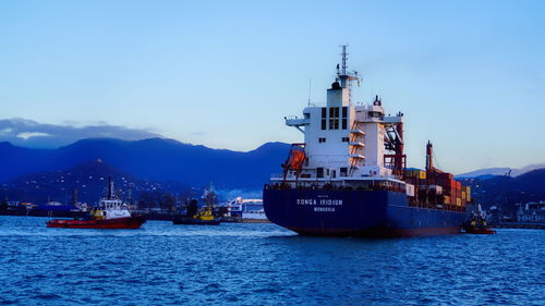 View of ship in sea against sky