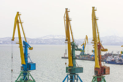 Port cranes and ships on commercial seaport petropavlovsk-kamchatsky city 