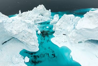 High angle view of icebergs in river