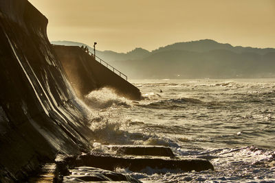 Scenic view of sea against sky during sunrise