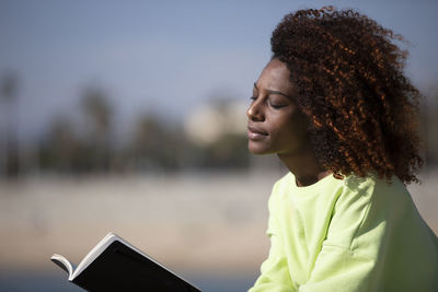 Young woman using mobile phone