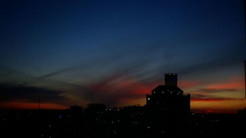 View of cityscape at sunset