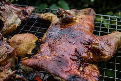 Close-up of meat on barbecue grill