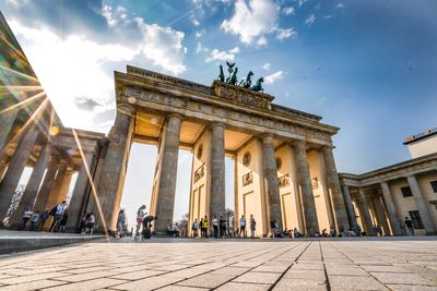 Low angle view of brandenburg gate against blue sky