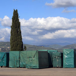 Built structure on field against sky