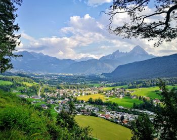 Scenic view of landscape and mountains against sky