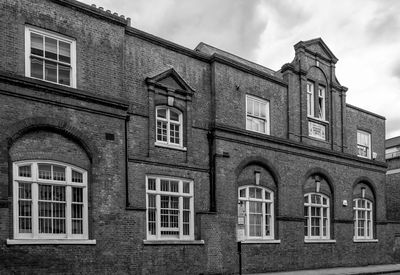 Old school building in clerkenwell against sky