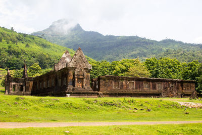 View of temple on building against sky