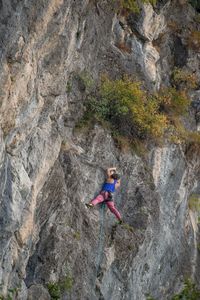 Full length of person on rock at mountain