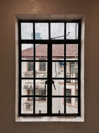 Building seen through glass window