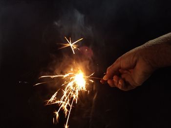 Firework display at night