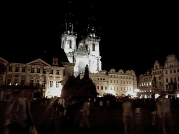 Tourists at night