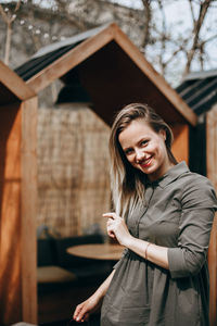 Young beautiful woman with long hair enjoying springtime.