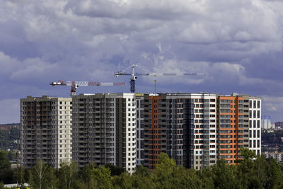 Low angle view of modern buildings against sky