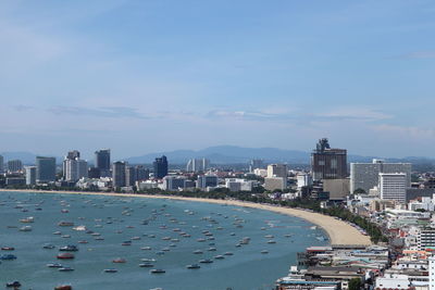 High angle view of modern buildings in city against sky