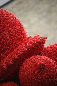 Close-up of red hat on carpet