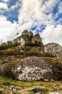 Scenic view of rock formation against sky