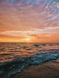 Scenic view of sea against sky during sunset