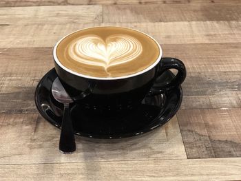 High angle view of cappuccino on table