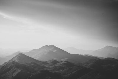 View of mountain range against cloudy sky