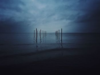 Scenic view of sea against sky at sunset