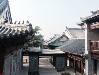 High angle view of old buildings against sky