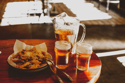 Close-up of beer in glass on table