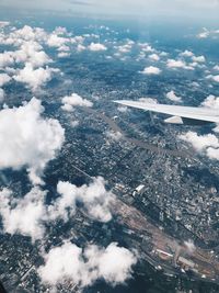 Aerial view of cityscape against sky