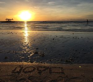 Scenic view of sea at sunset