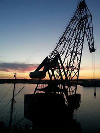 View of harbor at sunset