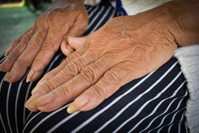 Midsection of woman showing hands