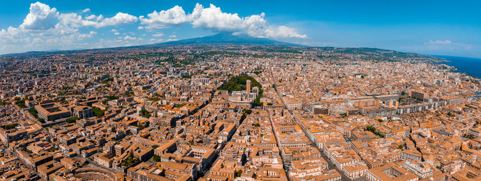 Aerial view on via etnea in catania. dome of catania and the main street with the background