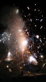 Firework display at night