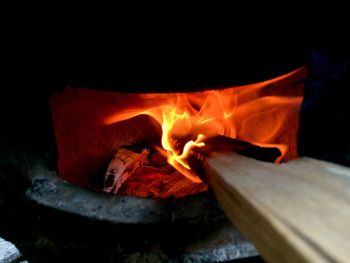 Close-up of fire burning in wood