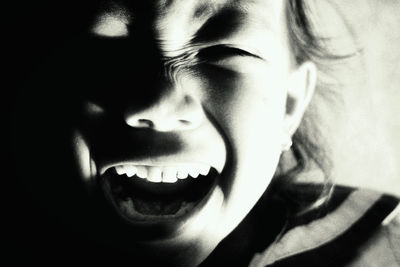 Close-up portrait of smiling girl