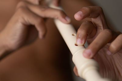 Cropped hand of person washing hands