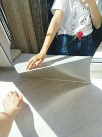 High angle view of woman working on table