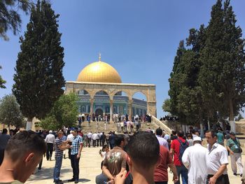 Group of people in front of building